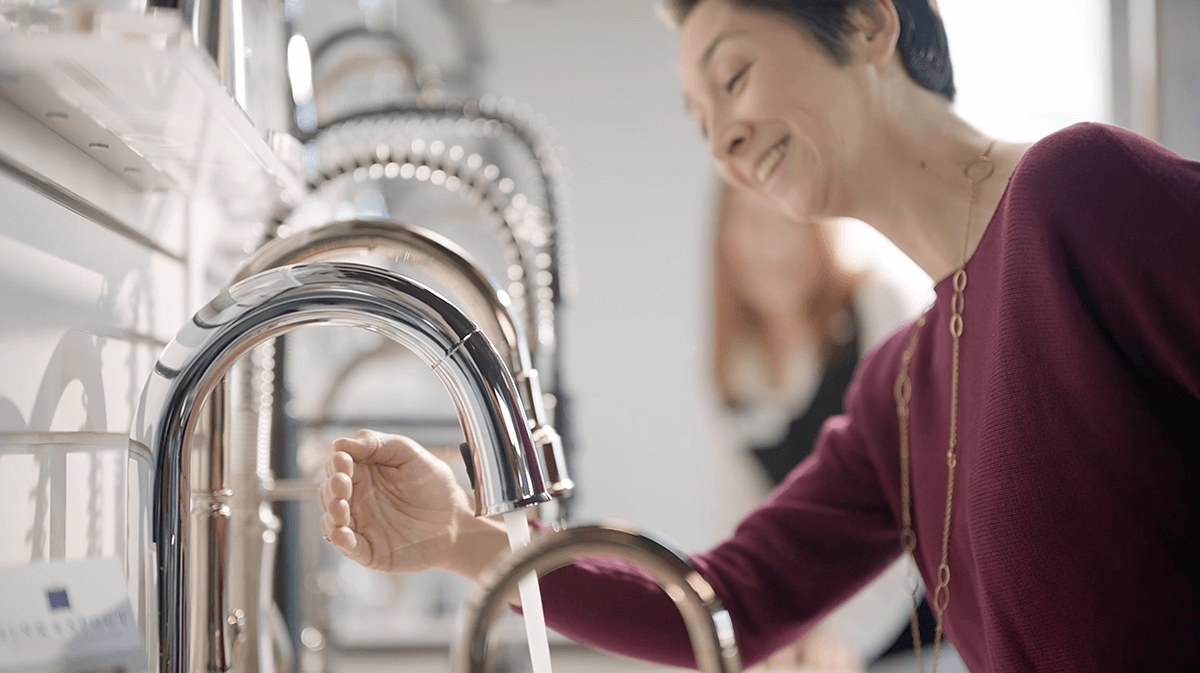 Testing faucets in the Sink & Spout showroom